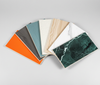 Various colors and textures catalog for PVC marble sheets and bamboo charcoal veneers.